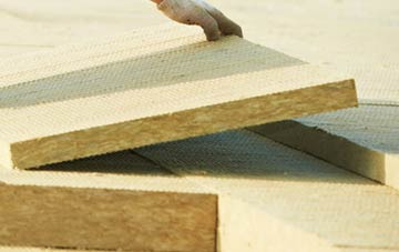 measuring Lower Cox Street tapered insulation